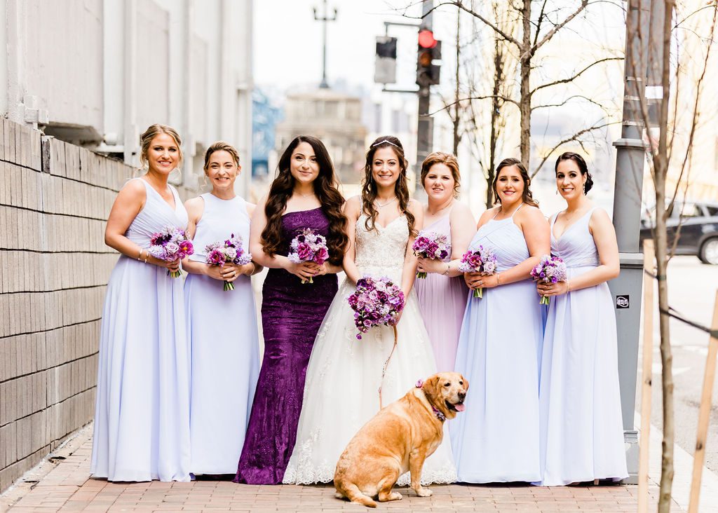 bride and bridesmaids purple spring wedding portrait