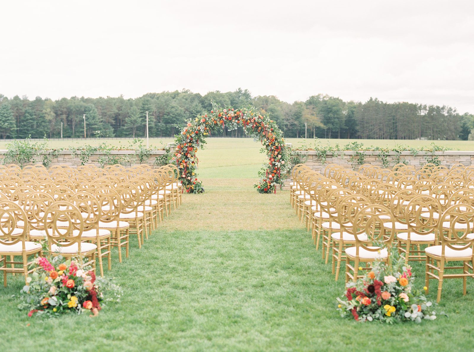outdoor ceremony arch floral wedding decor