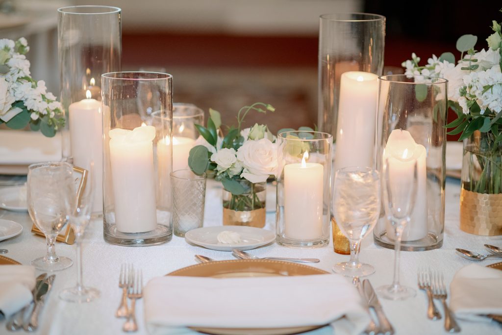 Timeless Candlelit wedding candle floral guest table centerpiece