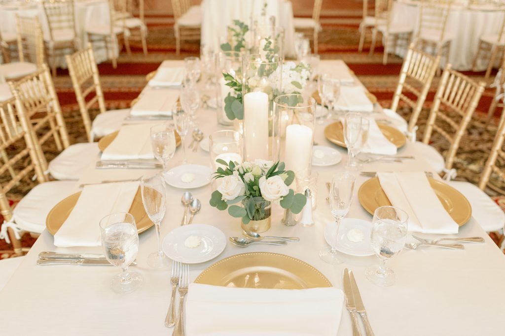 Timeless candlelit wedding long guest table reception centerpieces
