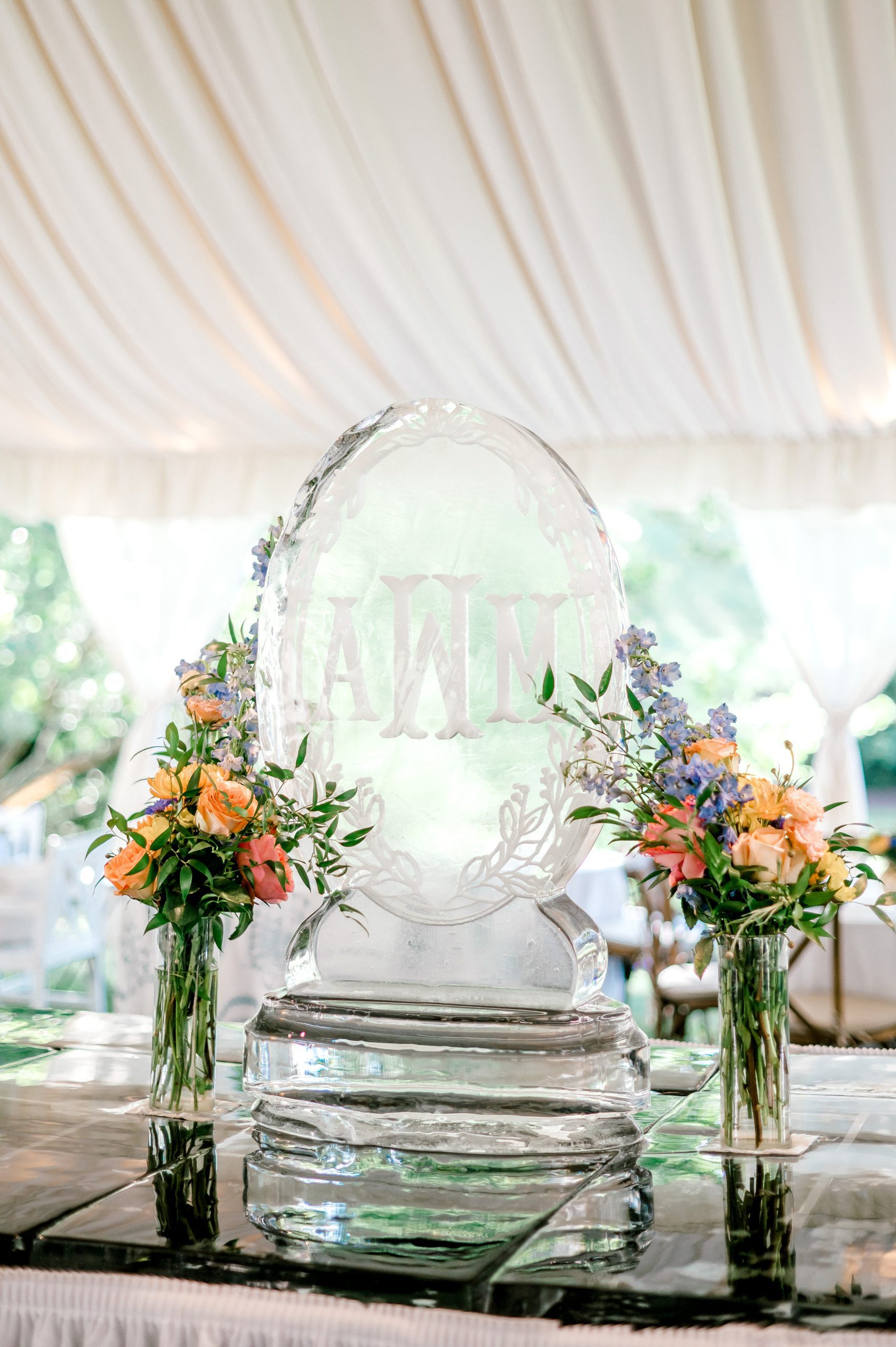 custom wedding monogram ice sculpture with floral accents