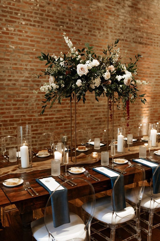 modern industrial romantic wedding reception tall centerpiece