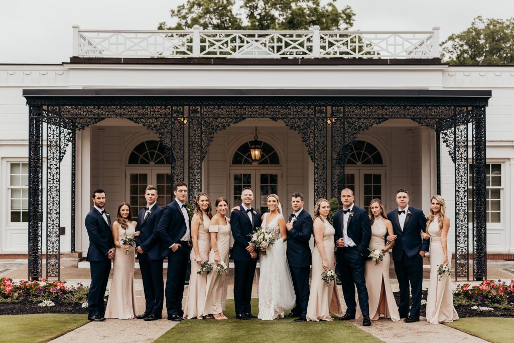 refined romance outdoor bridal party portrait