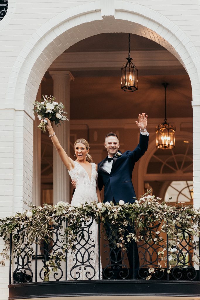 bride and groom wedding reception balcony grand entrance