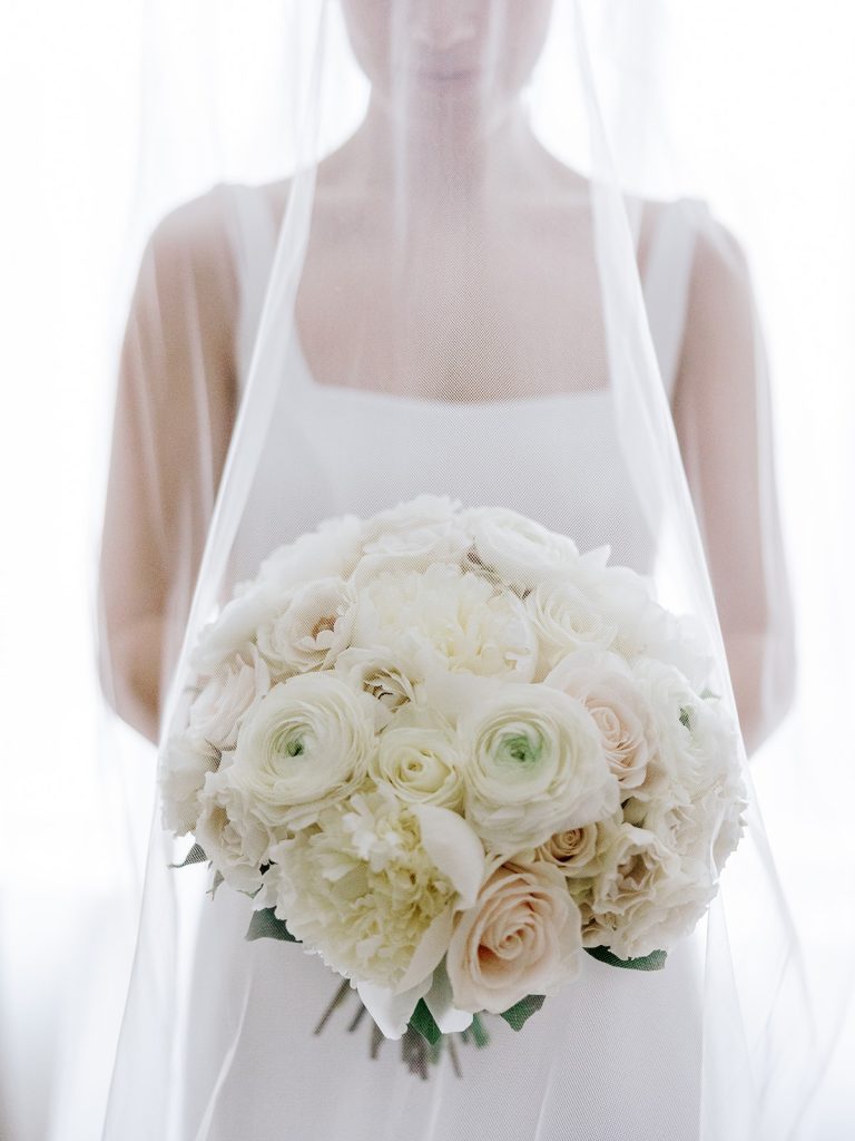 timeless winter wedding bridal bouquet white flowers