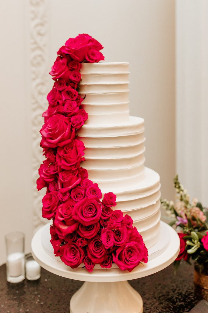 white wedding cake hot pink rose cascade