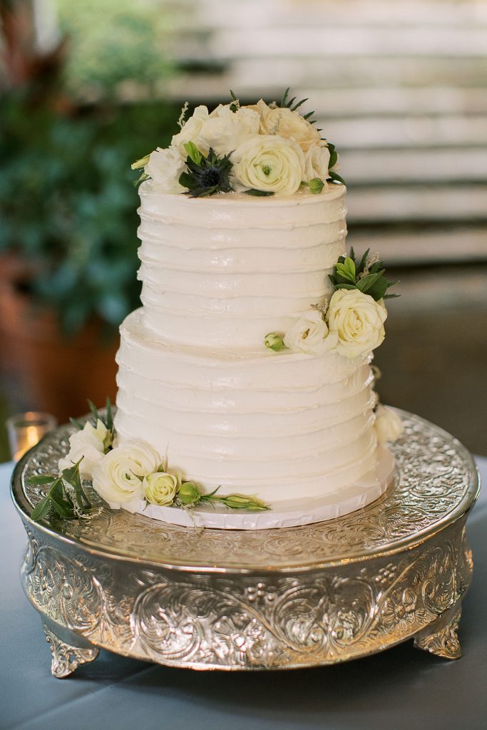 cool toned summer wedding cake fresh floral accents