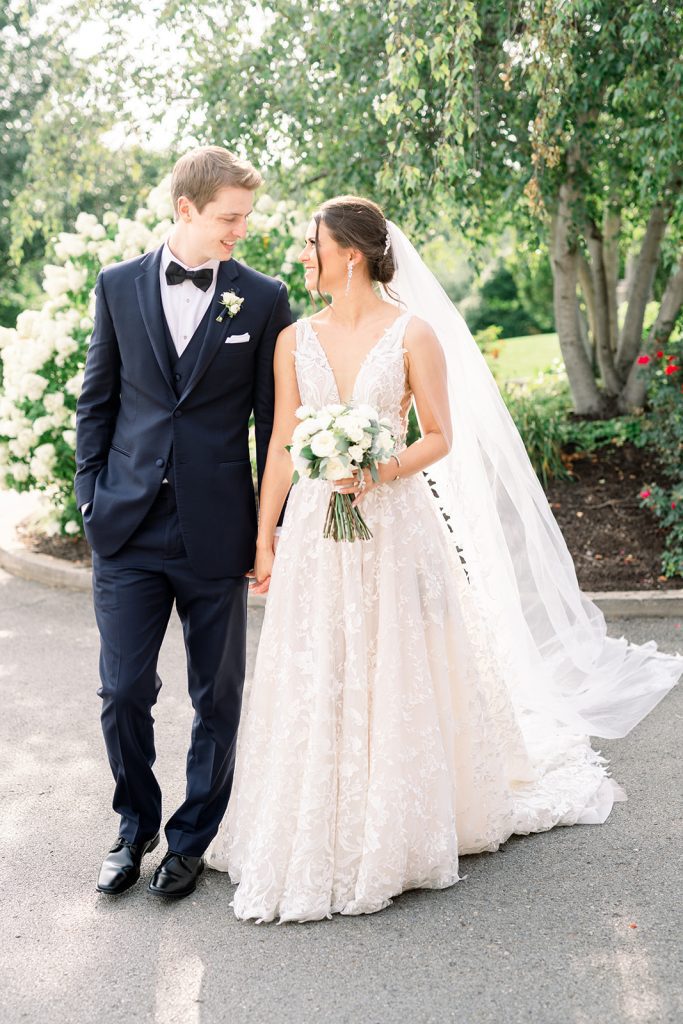 elegant and bright wedding bride and groom outdoor summer portrait